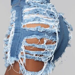 Yes now distressed denim Bermuda shorts